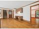 Versatile space with built-in desk, cabinets, hardwood floors and natural light, ideal for a home office at 3701 Bounty Ct, Matthews, NC 28104