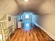 Finished bonus room with hardwood floors, natural light, and ample space for activities at 409 W Norment Ave, Gastonia, NC 28052