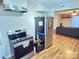 An efficient kitchen with stainless steel appliances and convenient access to the adjacent living area at 409 W Norment Ave, Gastonia, NC 28052