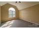 Vaulted ceiling bedroom with an arched window at 417 Garret Ln, York, SC 29745