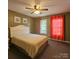 Cozy bedroom with carpet flooring and warm-toned accents at 417 Garret Ln, York, SC 29745