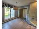 Bright breakfast nook with large windows and decorative wallpaper at 417 Garret Ln, York, SC 29745
