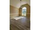 Bright dining room featuring large window and stylish laminate floors at 417 Garret Ln, York, SC 29745