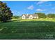 Charming one-story home with a well-manicured lawn and lush landscaping at 417 Garret Ln, York, SC 29745