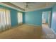 Spacious main bedroom with tray ceiling, carpet flooring, and natural light at 417 Garret Ln, York, SC 29745