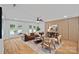 Cozy living room with hardwood floors, stylish furniture, and French doors to the outside at 4209 Windwood Cir, Charlotte, NC 28226