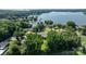 An aerial view of lakefront property surrounded by lush trees, capturing the essence of lakeside living at 4278 Harbor Ln, Sherrills Ford, NC 28673