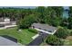 Aerial view of a single-Gathering home with a long driveway, and lush greenery surrounding the property at 4278 Harbor Ln, Sherrills Ford, NC 28673