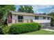 Beautiful home with a wood deck, an American flag, and a well-maintained lawn at 4278 Harbor Ln, Sherrills Ford, NC 28673