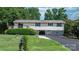 Well-kept home with a mailbox, lush lawn, and convenient drive-under garage at 4278 Harbor Ln, Sherrills Ford, NC 28673