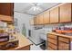Functional laundry room with washer, dryer, sink, and ample storage for convenience at 4278 Harbor Ln, Sherrills Ford, NC 28673