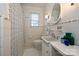 Traditional bathroom with floral shower curtain and white tile walls at 5301 Addison Dr, Charlotte, NC 28211