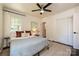 Cozy bedroom with hardwood floors, neutral walls, and plenty of natural light at 5301 Addison Dr, Charlotte, NC 28211