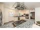 Modern kitchen features granite countertops, stainless steel appliances, and a sleek range hood at 5301 Addison Dr, Charlotte, NC 28211