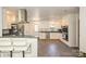 Bright kitchen featuring granite countertops, stainless steel appliances, and ample cabinet space at 5301 Addison Dr, Charlotte, NC 28211