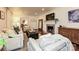 Comfortable living room showcasing hardwood floors, a fireplace, and stylish, neutral-toned furniture at 5301 Addison Dr, Charlotte, NC 28211