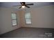 Bedroom featuring carpeted floors, and natural light from two windows at 561 Woodglenn Rd, Catawba, SC 29704