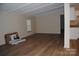 Spacious living room with hardwood floors and natural light from a window at 561 Woodglenn Rd, Catawba, SC 29704