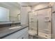 Bathroom with a sleek sink, modern shower with glass doors, and a clean, contemporary design at 6140 Balham Ct # Ken0059, Charlotte, NC 28215
