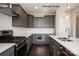 Close up of modern kitchen details, featuring subway tile backsplash and stainless steel appliances at 6140 Balham Ct # Ken0059, Charlotte, NC 28215