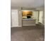 Open-concept living space seamlessly connects the living room and the kitchen at 6260 Rosecroft Dr, Charlotte, NC 28215