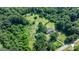Secluded home surrounded by lush greenery, offering privacy and a serene environment at 6314 Providence Church Rd, Vale, NC 28168