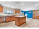 Open kitchen area with center island and adjacent dining room at 6314 Providence Church Rd, Vale, NC 28168