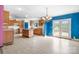 Spacious kitchen with an island and french doors leading to a deck at 6314 Providence Church Rd, Vale, NC 28168