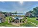 A scenic aerial view of a community pool, beach, and surrounding residences at 633 Portside Dr, Davidson, NC 28036