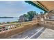 Spacious balcony overlooking a lake and community with direct beach access at 633 Portside Dr, Davidson, NC 28036