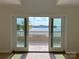 Scenic view from the balcony featuring a lake and lush greenery, enhancing the property's appeal at 633 Portside Dr, Davidson, NC 28036