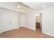 Spacious bedroom with hardwood floors, large closets, and adjacent bathroom at 633 Portside Dr, Davidson, NC 28036