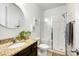 Elegant bathroom features a glass shower, granite countertops, and modern fixtures at 7327 Snowbird Ct, Mint Hill, NC 28227
