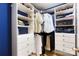 Walk-in closet with custom shelving and storage solutions perfect for organization at 7327 Snowbird Ct, Mint Hill, NC 28227