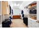 Spacious walk-in closet with custom shelving and ample storage at 7327 Snowbird Ct, Mint Hill, NC 28227