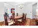 Dining room with hardwood floors, a neutral color palette, and space for dinner parties at 7327 Snowbird Ct, Mint Hill, NC 28227
