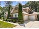 Beautiful home with well-kept lawn, two car garage, and lush landscaping at 7327 Snowbird Ct, Mint Hill, NC 28227