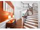 Grand foyer boasting a beautiful staircase, hardwood floors, and elegant decor at 7327 Snowbird Ct, Mint Hill, NC 28227