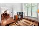 Comfortable home office with natural light, adjacent to the dining room at 7327 Snowbird Ct, Mint Hill, NC 28227