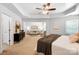 Large main bedroom with a sitting area, neutral decor, and natural light at 7327 Snowbird Ct, Mint Hill, NC 28227