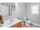 Bathroom featuring a sink vanity, toilet, and shower at 773 Hathcock Glen Dr, Oakboro, NC 28129
