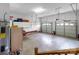 Spacious and well-lit garage with ample storage, multiple doors, and utility connections at 773 Hathcock Glen Dr, Oakboro, NC 28129