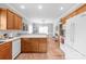 Open concept kitchen with stainless appliances overlooking dining area at 773 Hathcock Glen Dr, Oakboro, NC 28129