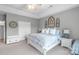 Inviting main bedroom with tray ceiling, decorative accents, and neutral color scheme at 773 Hathcock Glen Dr, Oakboro, NC 28129