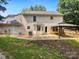 Spacious backyard with a patio area and a wooden gazebo at 8701 Holly Creek Ct, Charlotte, NC 28216