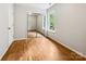 Bedroom with a mirrored closet and hardwood flooring at 8701 Holly Creek Ct, Charlotte, NC 28216