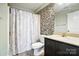 Bathroom showcases a shower, tile backsplash, and modern fixtures at 1006 Spring Rose Ln, Matthews, NC 28104