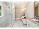 Bathroom featuring a walk-in shower, tub, and granite countertops at 101 Mcalway Rd, Charlotte, NC 28211