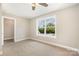 This cozy bedroom features natural light from its window and convenient access to a walk-in closet at 101 Mcalway Rd, Charlotte, NC 28211