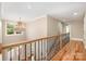 Hallway with chandelier and view of staircase at 101 Mcalway Rd, Charlotte, NC 28211